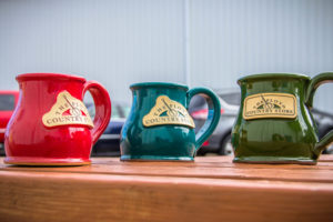 Stoneware mugs in three glaze colors