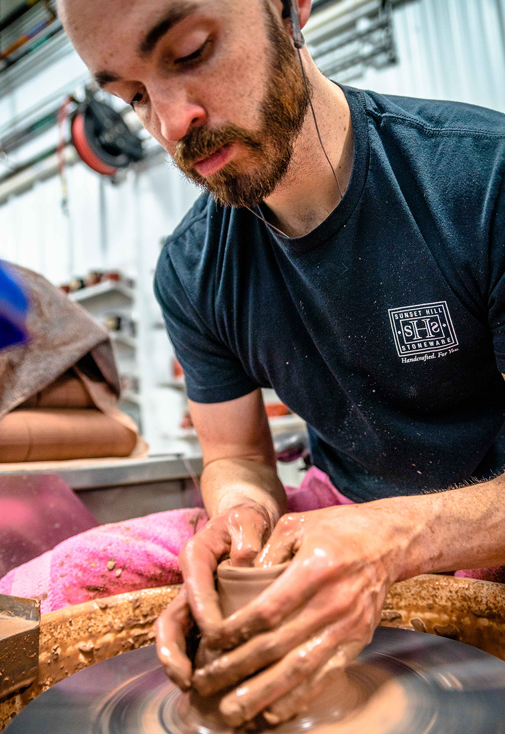 Potter working at Sunset Hill Stoneware