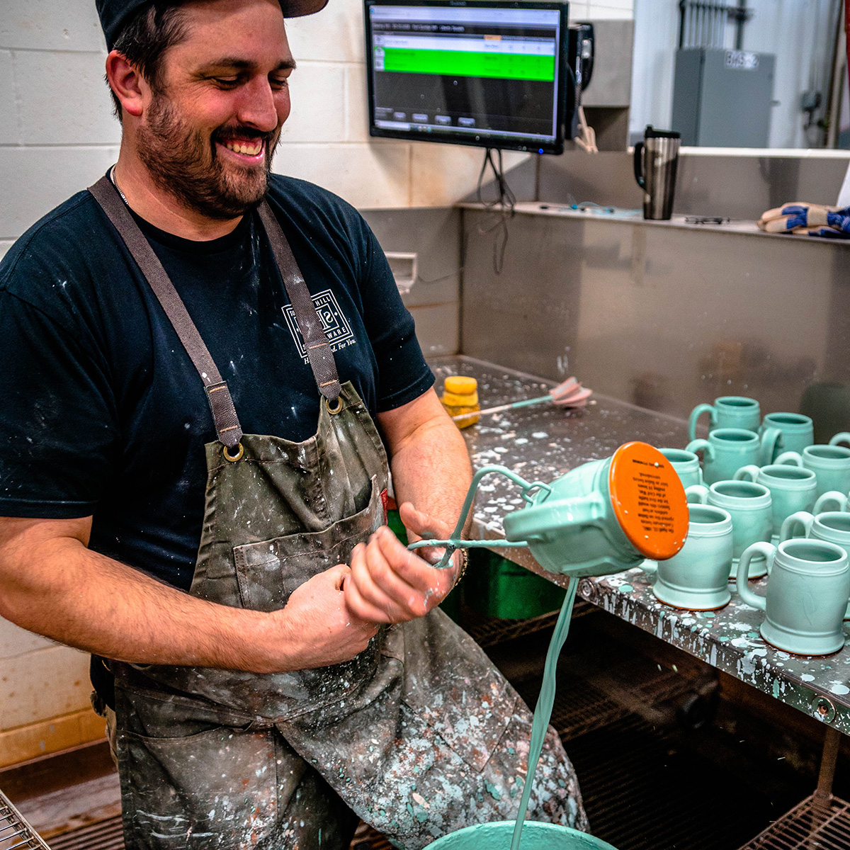 Sunset Hill Stoneware glazer making stoneware mugs